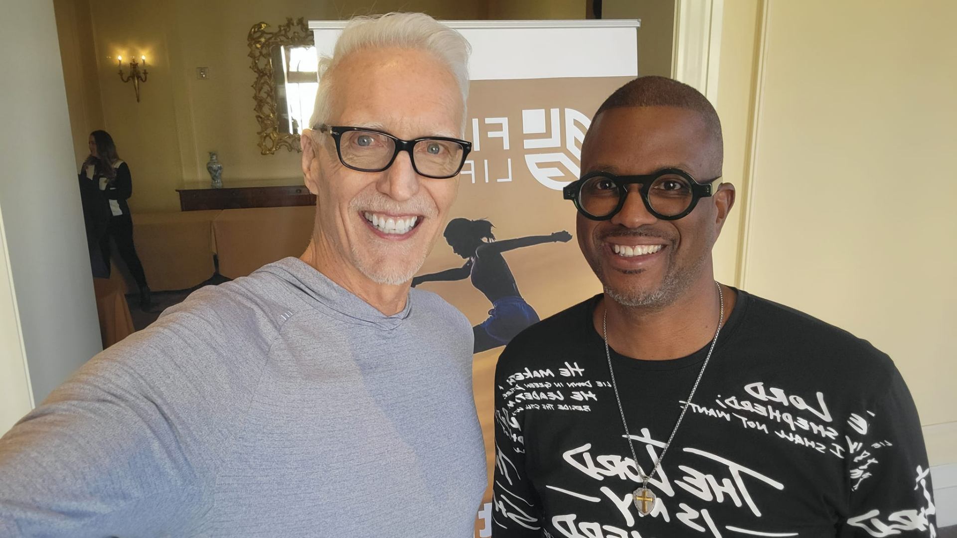 Corey Artis with motivational speaker Dan Lier at a FinFit Life event
