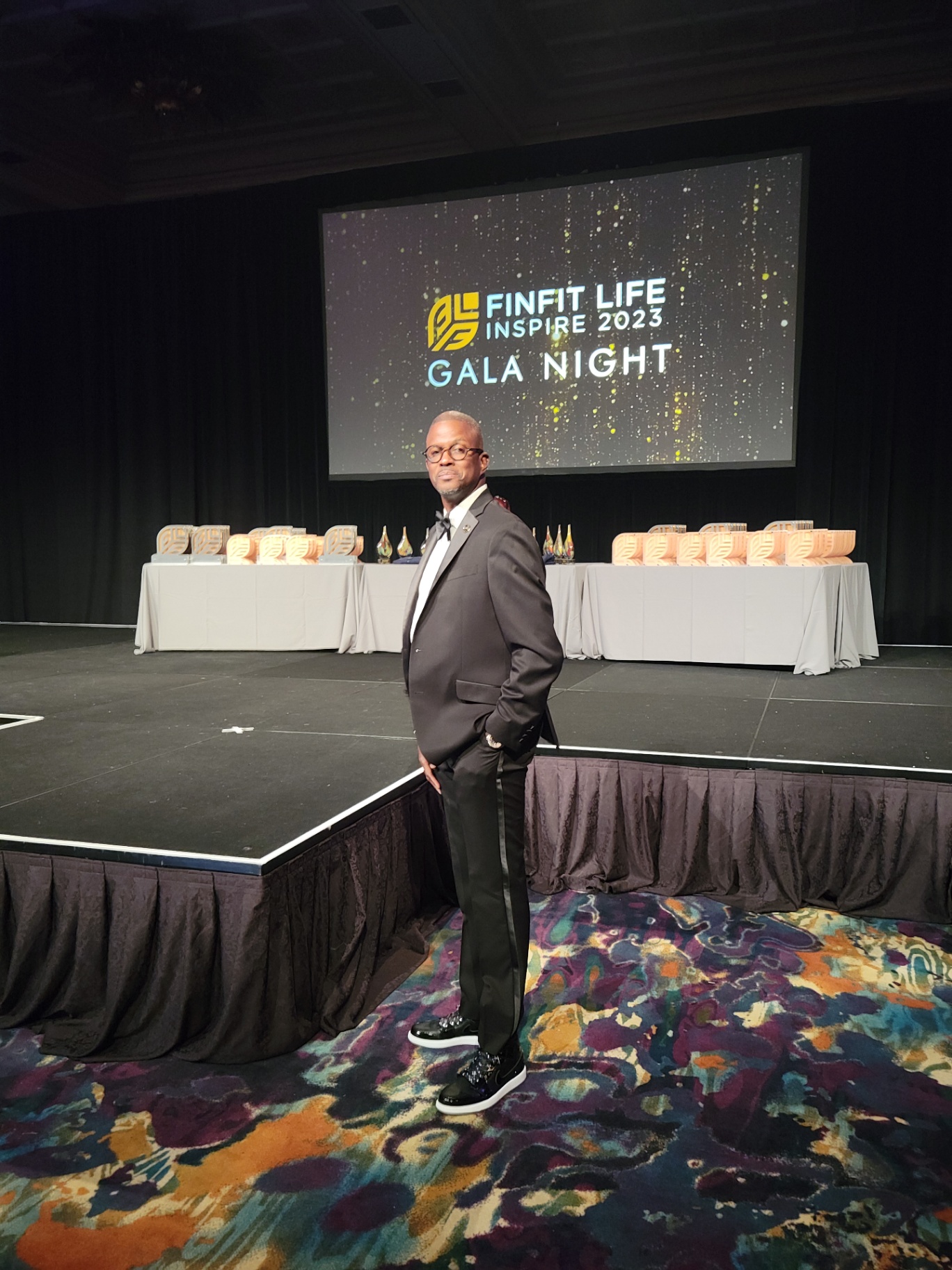 Recognition moment on stage at the annual gala