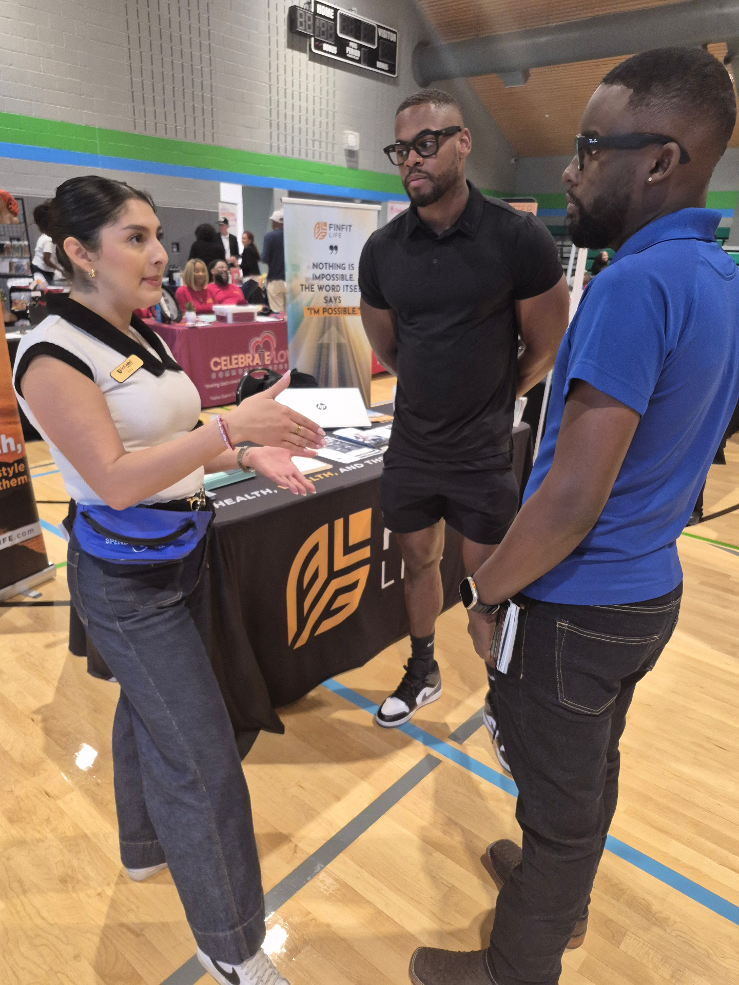 Artis Insurance Group team member educating community members at a local event