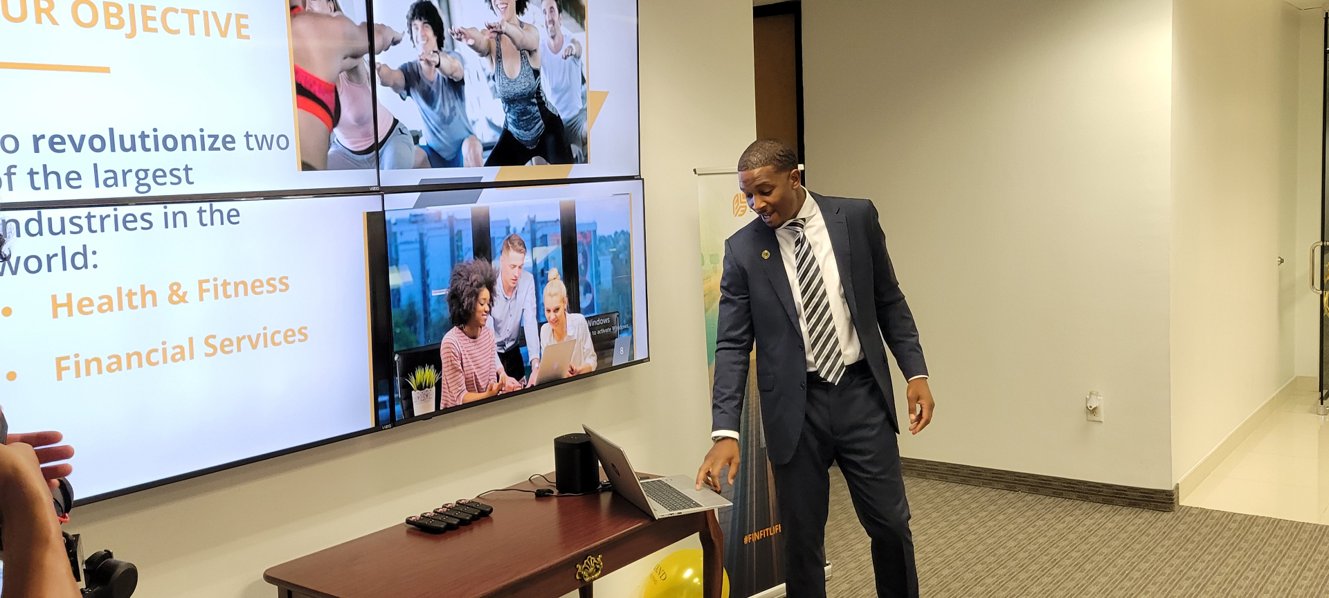 Corey Artisi presenting the FinFit mission to revolutionize health and financial services