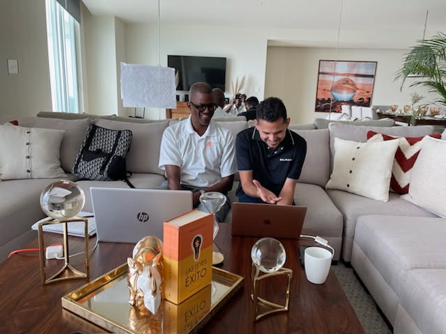 Corey Artis meeting in a Cancun penthouse for a strategic FinFit Life expansion discussion